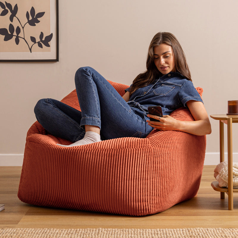 Fauteuil poire Natalia en velours côtelé, couleur terracotta