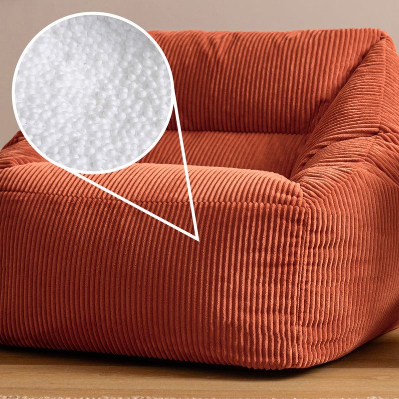 Fauteuil poire Natalia en velours côtelé, couleur terracotta